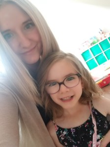 Melissa a 25 year old with long blonde hair and brown eyes with her daughter Hailey a 5 years old with brown hair and brown eyes.