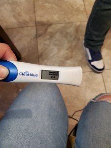 Photo of a clearblue pregnancy test that says "pregnant 2-3"